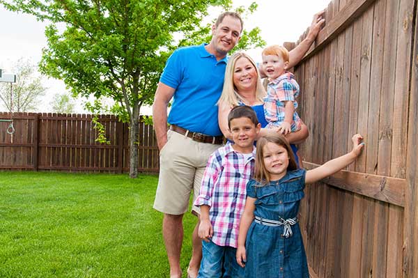 Family of five on yard