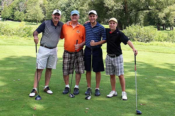 Four Men Golfing